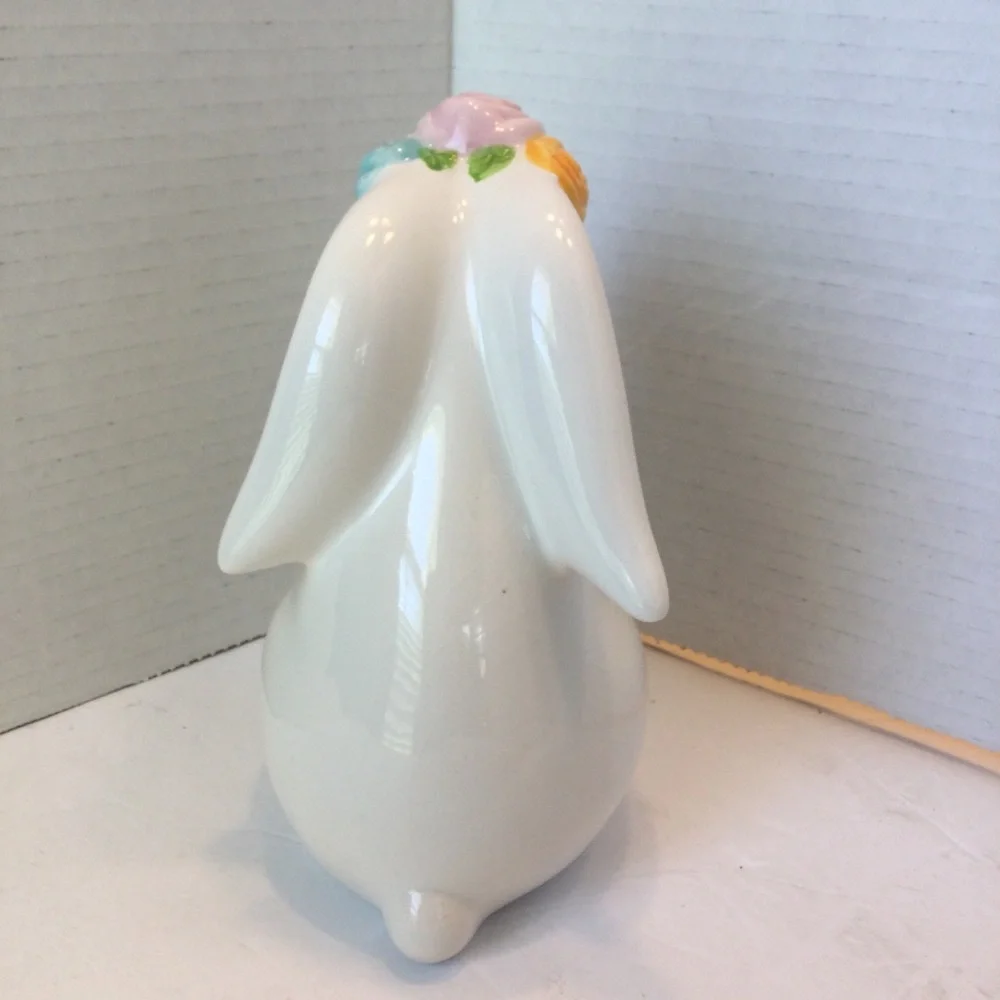 Ceramic Bunny Figurine holding book with Floral Accents